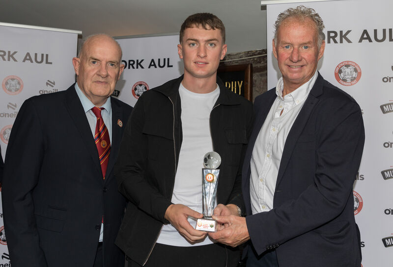 Dan O'Flynn presents the Golden Boot Award for the Premier Division to Luke Casey of Coachford also present is Jim Cashman of Heineken Ireland at the annual awards night of the AUL that was held at the Kiln, Heineken Brewery, Cork. - Picture: David Creedon Dan O'Flynn presents the Golden Boot Award for the Premier Division to Luke Casey of Coachford also present is Jim Cashman of Heineken Ireland at the annual awards night of the AUL that was held at the Kiln, Heineken Brewery, Cork. - Picture: David Creedon