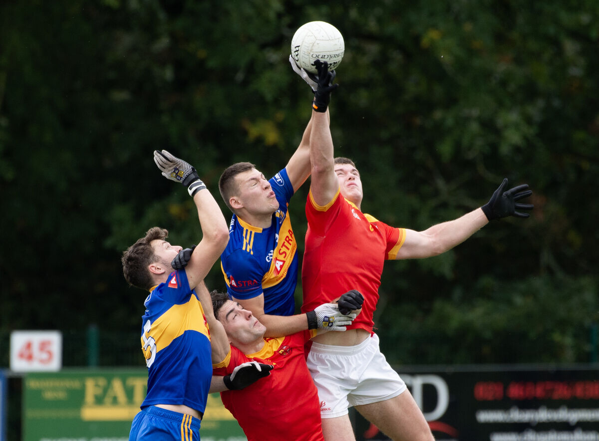 Carrigaline's Kevin and Kieran Kavanagh contest aerial possession against Mallow duo Shane Merritt and Darragh Moynihan in the 2023 Bon Secours Hospital Premier SFC relegation play-off in Blarney. Picture: Dan Linehan Carrigaline's Kevin and Kieran Kavanagh contest aerial possession against Mallow duo Shane Merritt and Darragh Moynihan in the 2023 Bon Secours Hospital Premier SFC relegation play-off in Blarney. Picture: Dan Linehan