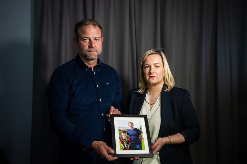 Craig Coady with the Irish Examiner's Deirdre O'Shaughnessy, as he holds a photograph of himself and his late son Rory. Picture: Chani Anderson.