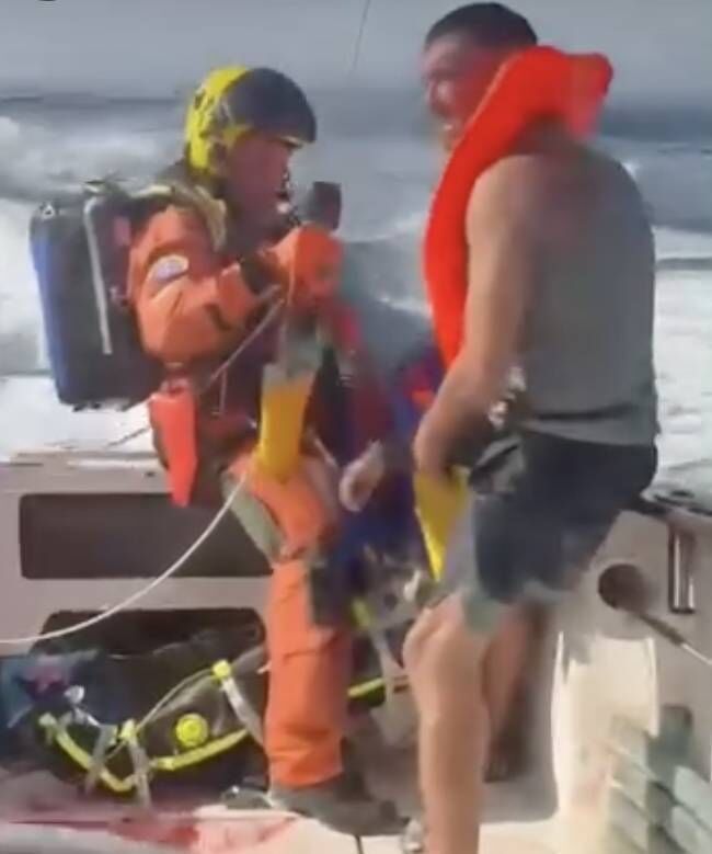An image of the rescue on board the angling boat. Picture: Facebook An image of the rescue on board the angling boat. Picture: Facebook