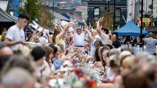 <p>Liam Maher leads the Mexican wave at the Cork on a Fork Long Table event on MacCurtain Street. Pictures: Chani Anderson</p> <p>Liam Maher leads the Mexican wave at the Cork on a Fork Long Table event on MacCurtain Street. Pictures: Chani Anderson</p>