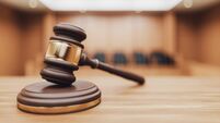 Gavel on a Courtroom Desk