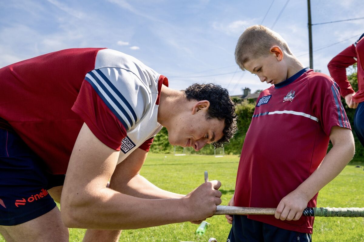  Donncha O’Mahony pictured signing Charlie Nyhan‘s hurley.