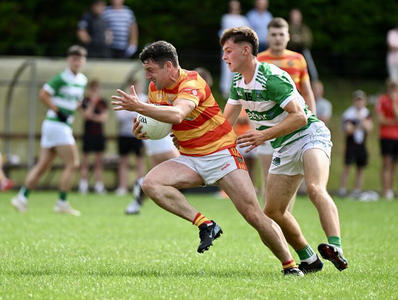 Micheál McSweeney of Newcestown is tackled by Shane Ryan of Valley Rovers. Picture: Larry Cummins Micheál McSweeney of Newcestown is tackled by Shane Ryan of Valley Rovers. Picture: Larry Cummins