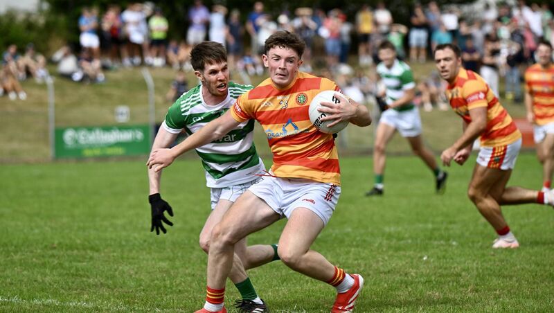 Daire McAree holds possession for Newcestown against Cian O'Keeffe of Valley Rovers. Picture: Larry Cummins Daire McAree holds possession for Newcestown against Cian O'Keeffe of Valley Rovers. Picture: Larry Cummins