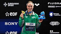 Ellen Walshe celebrates after winning gold 15/8/2026