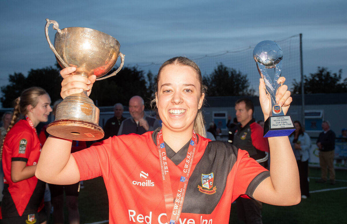 Ringmahon captain Kayleigh Still holds aloft the CWSSL Kevin Barry Cup and Player of the Match Award following her teams victory over Midleton in the final which was played in St Colman's Park recently. Picture: Howard Crowdy