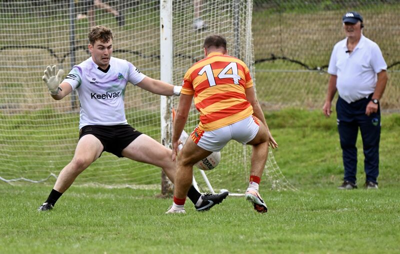 Valley Rovers goalkeeper Billy Curtin and Jack Meade of Newcestown fight for the ball. Picture: Larry Cummins Valley Rovers goalkeeper Billy Curtin and Jack Meade of Newcestown fight for the ball. Picture: Larry Cummins