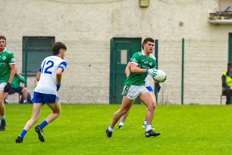 Ballincollig’s Darragh O’Mahoney clears the ball as Knocknagree’s Killian Cronin closes in. Picture: Noel Sweeney Ballincollig’s Darragh O’Mahoney clears the ball as Knocknagree’s Killian Cronin closes in. Picture: Noel Sweeney