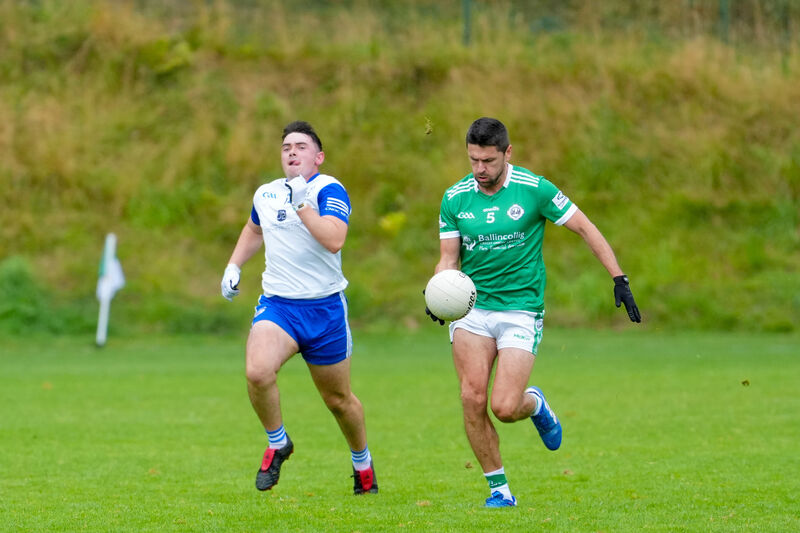 Ballincollig’s JP Murphy brings the ball out of defence, chased by Knocknagree's Niall O'Connor. Picture: Noel Sweeney Ballincollig’s JP Murphy brings the ball out of defence, chased by Knocknagree's Niall O'Connor. Picture: Noel Sweeney