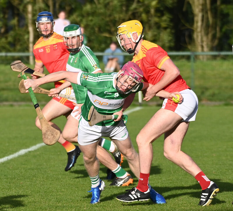 Aghabullogue's Paul Ring is tackled by Mallow's Bill Kingston. Picture: Eddie O'Hare Aghabullogue's Paul Ring is tackled by Mallow's Bill Kingston. Picture: Eddie O'Hare