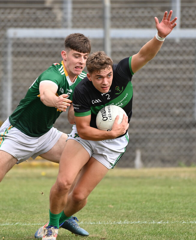 Nemo Rangers' Neville O'Shea is tackled by St Michael's Sam Murphy. Picture: Eddie O'Hare Nemo Rangers' Neville O'Shea is tackled by St Michael's Sam Murphy. Picture: Eddie O'Hare