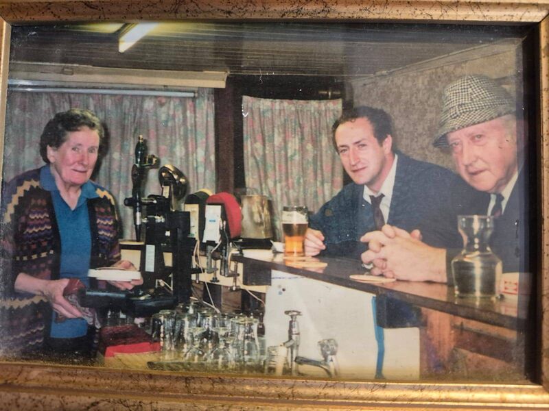 Sheila, known as ‘Mother’, Denis Jr, and Denis Sr, known as ‘The Boss’, in Murray’s bar in Macroom Sheila, known as ‘Mother’, Denis Jr, and Denis Sr, known as ‘The Boss’, in Murray’s bar in Macroom