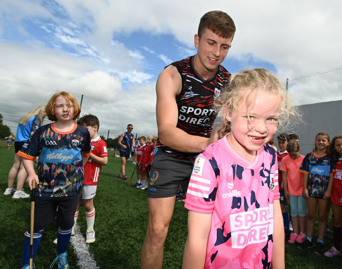 Cork senior hurler Diarmuid Healy signs autographs foe Ellie Kiely at the Brian Dillons Cúl Camp at the club in the Tank field. Pictures: Eddie O'Hare Cork senior hurler Diarmuid Healy signs autographs foe Ellie Kiely at the Brian Dillons Cúl Camp at the club in the Tank field. Pictures: Eddie O'Hare