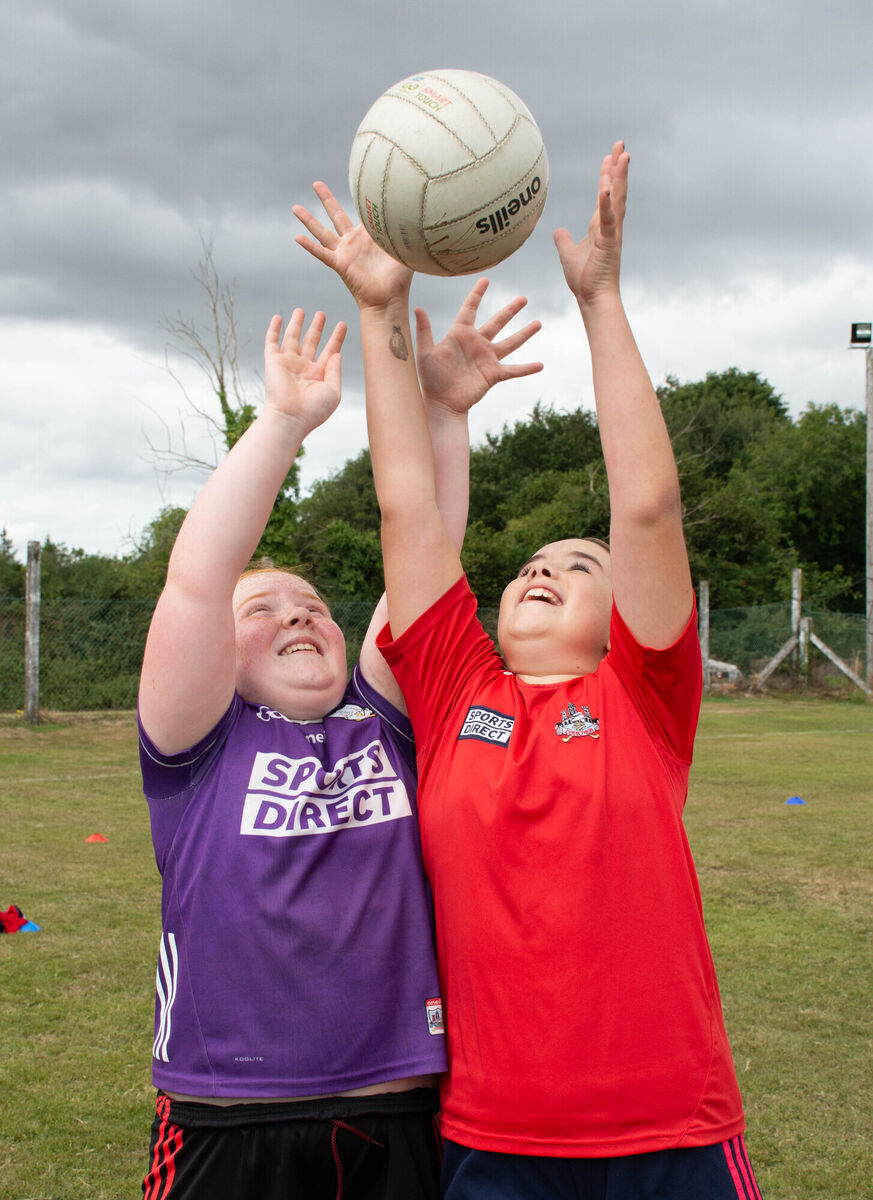 Sarah Crowley and Lilly Mai Kennedy reach for a high ball during the recent Kiltha Og Cul Camp in Castlemartyr. Picture: Howard Crowdy Sarah Crowley and Lilly Mai Kennedy reach for a high ball during the recent Kiltha Og Cul Camp in Castlemartyr. Picture: Howard Crowdy