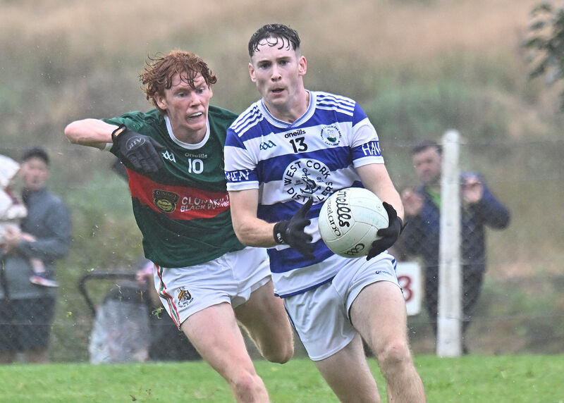 Michael Maguire bears down on goal chased by Clonakilty's Des Kenneally. Picture: Martin Walsh. Michael Maguire bears down on goal chased by Clonakilty's Des Kenneally. Picture: Martin Walsh.