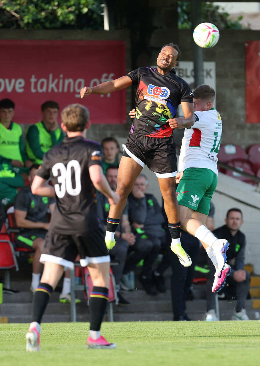 Niall O'Keeffe, Cork City, battles in the air with Jason Oyenuga, Treaty United. Picture: Jim Coughlan. Niall O'Keeffe, Cork City, battles in the air with Jason Oyenuga, Treaty United. Picture: Jim Coughlan.