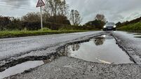 Potentially tyre-ripping potholes on a road in East Sussex 01