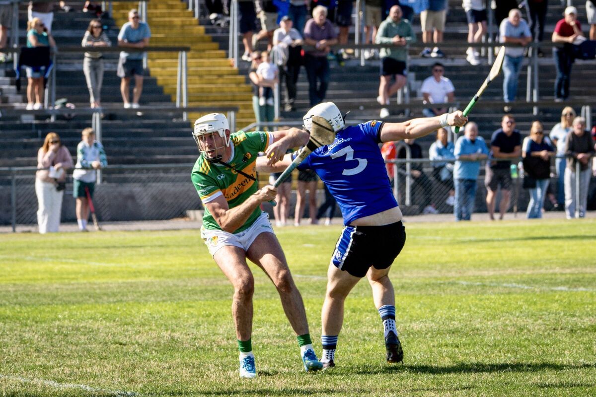 Newtownshandrum's Tim O'Mahony bursting towards the goal after making a catch. Picture: Chani Anderson