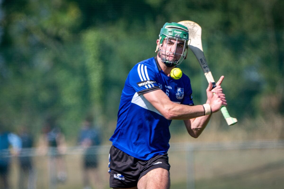 Cillian Roche of Sarsfields sends the sliotar down the field. Picture: Chani Anderson