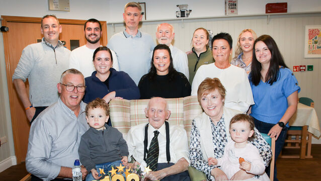 <p>Jimmy Lynam with members of his family at his 100th birthday celebrations last October. Picture: David Creedon</p>