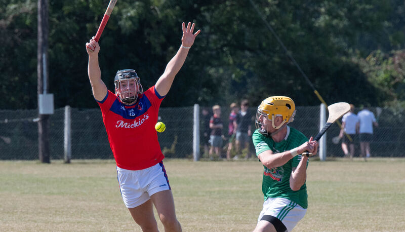 Killeagh's Sean Long about to clear the sliotar upfield from Finn O'Brien. Picture: Howard Crowdy