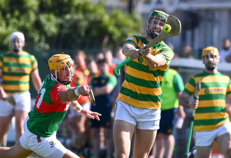  Blackrock's Alan O'Callaghan clears his lines as Fr O'Neill's Declan Dalton closes in during their Premier SHC clash at Midleton. Picture: David Keane.