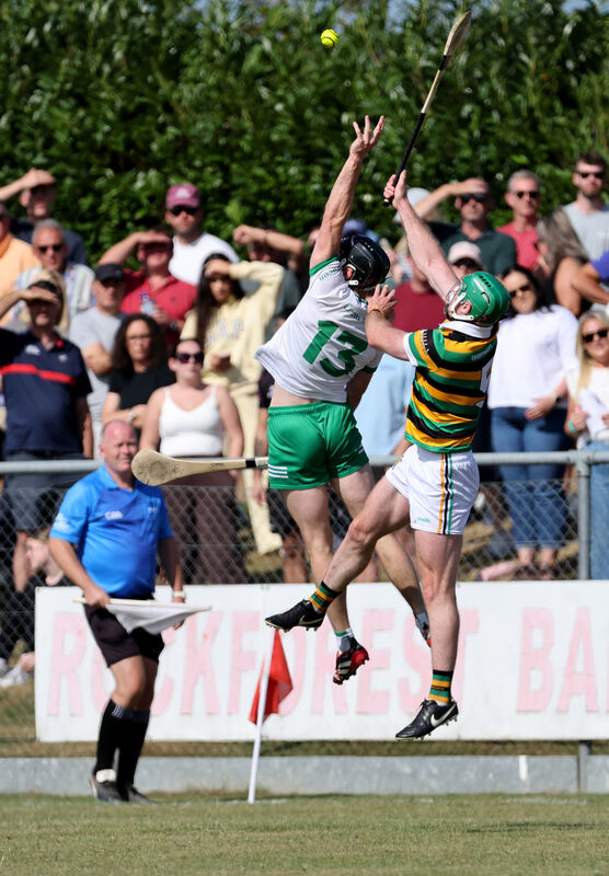 Luke Horgan, Glen Rovers, and Daniel O'Connell, Kanturk, under the dropping ball. Picture: Jim Coughlan.