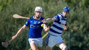 <p>Ballinhassig’s Evan Cullinane is chased by Inniscarra’s Andrew McCarthy. Picture: Chani Anderson</p>