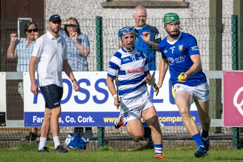 Ballinhassig’s Conor Desmond looks for a gap in Inniscarra’s defence. Picture: Chani Anderson