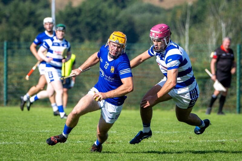 Ballinhassig’s Brian Lynch is chased by Inniscarra’s David Keane. Picture: Chani Anderson