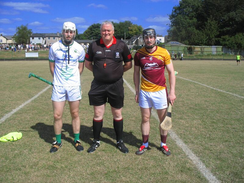 Referee Pat Lyons accompanied by Sean Harrington (Passage) and Killian Ryan (Whitechurch) at Ballinlough. 
