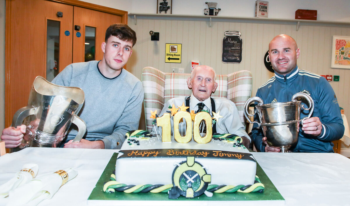 Robert Downey (left) and Dean Brosnan with the late Jimmy Lynam at his 100th birthday celebrations at Care Choice Ballynoe, White's Cross in October of last year. Picture: David Creedon