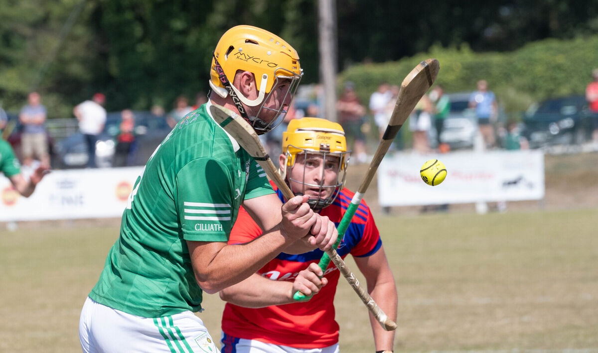 Killeagh's Brendan Delaney about to clear from Erin's Own's Matt O'Riordan. Picture: Howard Crowdy