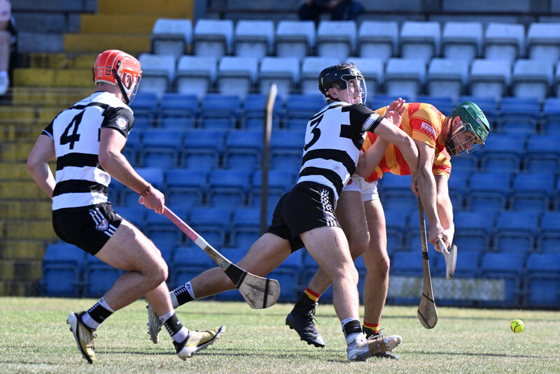 Midleton defender Tadhg O'Leary Hayes takes the sting out of a shot on goal by Sean O'Donovan, Newcestown. Picture: Larry Cummins Midleton defender Tadhg O'Leary Hayes takes the sting out of a shot on goal by Sean O'Donovan, Newcestown. Picture: Larry Cummins