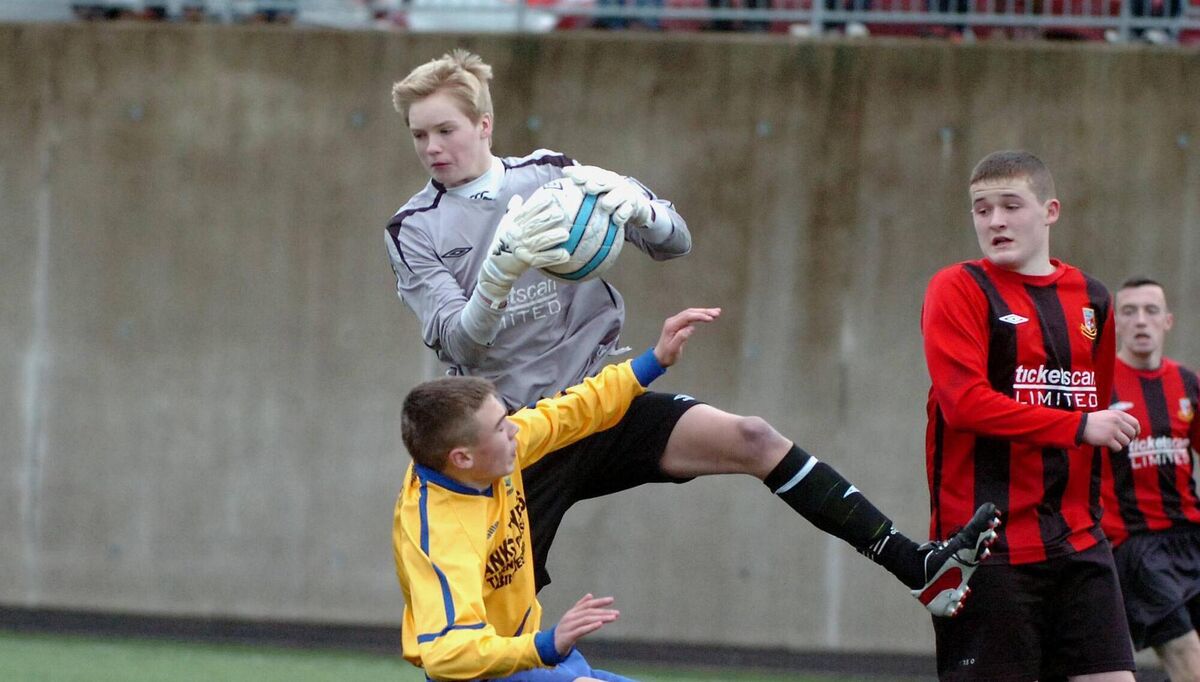 Ringmahon Rangers keeper Caoimhin Kelleher claims possession in the air, under pressure from Carrigaline attacker Aaron Drinan, in a CSL clash in 2013. Picture: Larry Cummins Ringmahon Rangers keeper Caoimhin Kelleher claims possession in the air, under pressure from Carrigaline attacker Aaron Drinan, in a CSL clash in 2013. Picture: Larry Cummins