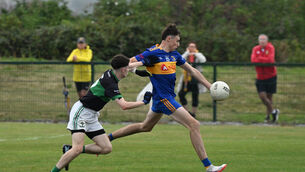 <p> Luke Jordan blasts in a goal for Carrigaline against Nemo Rangers. Picture: Larry Cummins</p>