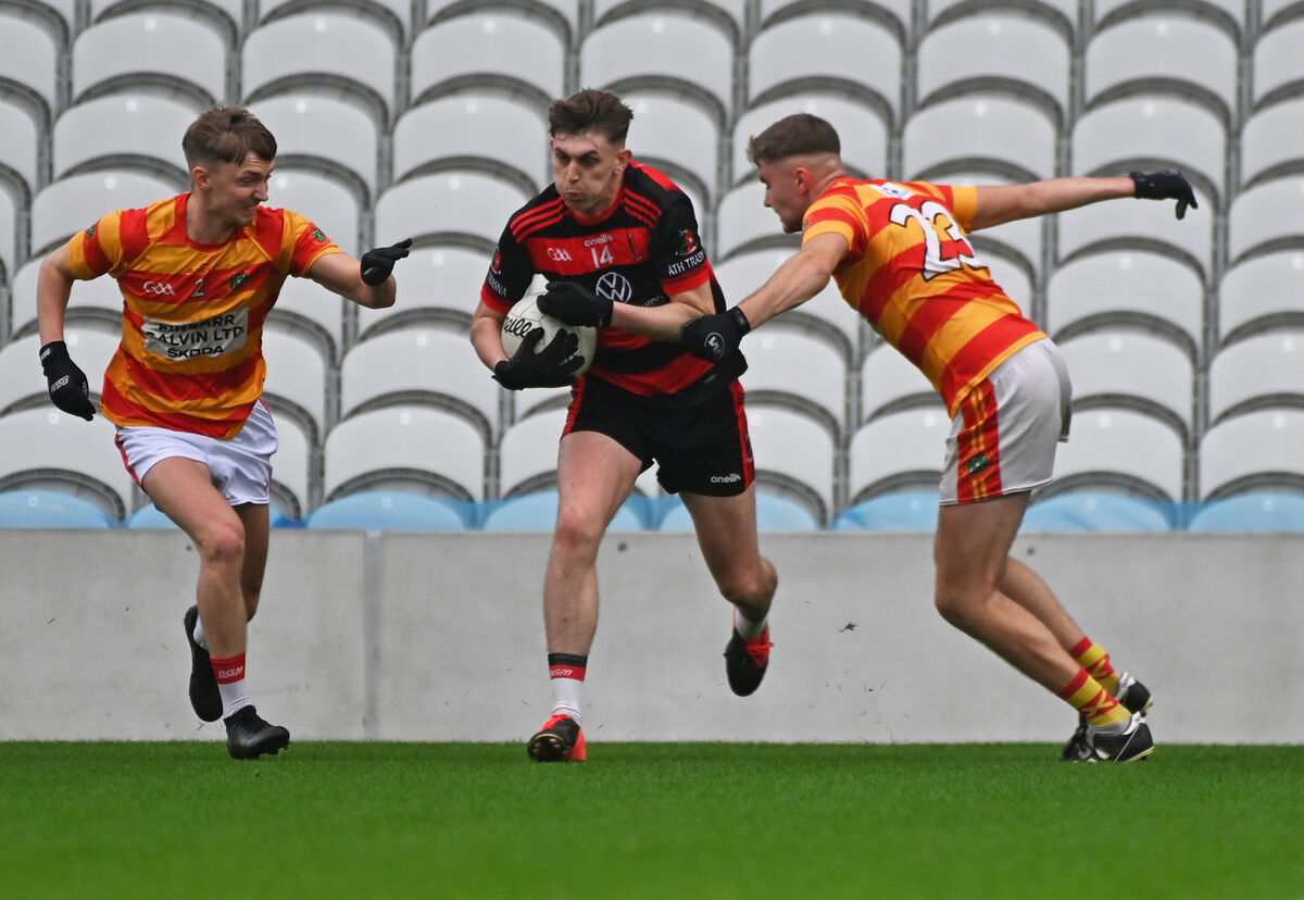 Newmarket's Ryan O'Keeffe breaking between Newcestown's Niall Murray and Joe Kenneally. Picture: Eddie O'Hare