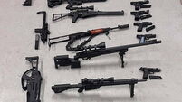 Two men arrested after 22 fake firearms and cannabis seized
