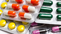 Colorful medicines closeup on white background