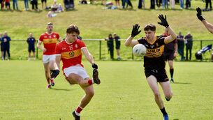 <p>Éire Óg’s Darragh Clifford seeks to score a point as Clyda Rovers' David Walsh looks to defend. Picture: Noel Sweeney</p>