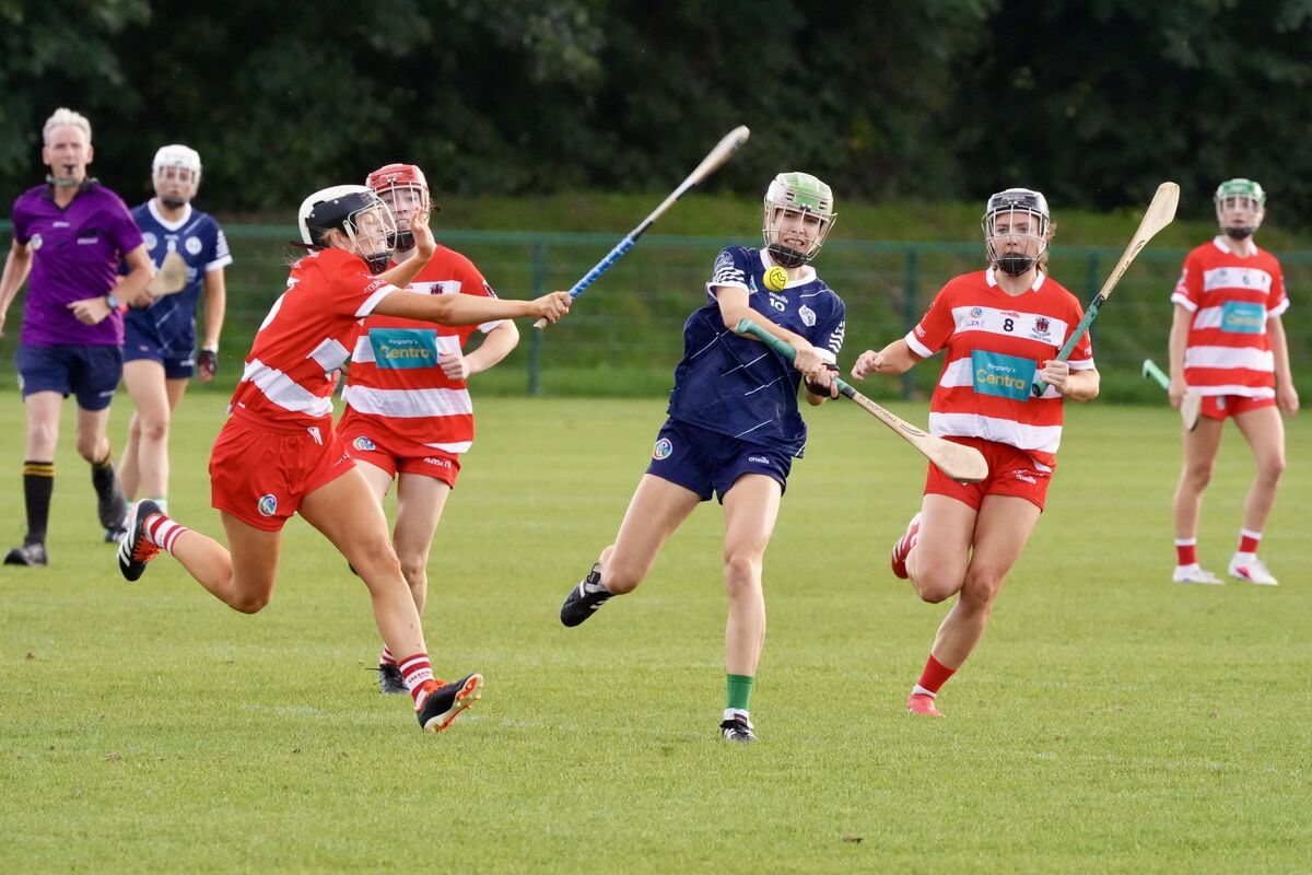Courcey Rovers' Aisling Maloney tries to block Ballincollig’s Sorcha McCarthy's shot during their SE Systems Senior Camogie Championship clash at Ballinora. Picture: Noel Sweeney Courcey Rovers' Aisling Maloney tries to block Ballincollig’s Sorcha McCarthy's shot during their SE Systems Senior Camogie Championship clash at Ballinora. Picture: Noel Sweeney