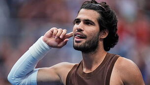 Carlos Alcaraz makes light work of US Open comeback with straight-sets win