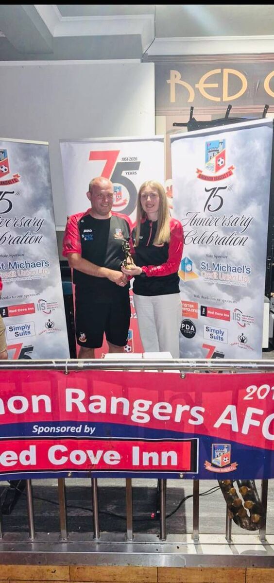Ringmahon Rangers senior women's player of the year Lena Henry receives her award from Paul Higgins. CG 