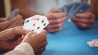 iStock-615419388.jpg Retired people playing card
