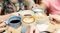 Friends having coffee together