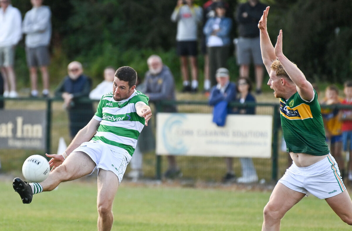 Valley Rovers' Eoin Delaney scores a two-pointer past St Michael's Eoin Hickey during their Premier SFC clash at Shanbally. Picture: David Keane. Valley Rovers' Eoin Delaney scores a two-pointer past St Michael's Eoin Hickey during their Premier SFC clash at Shanbally. Picture: David Keane.
