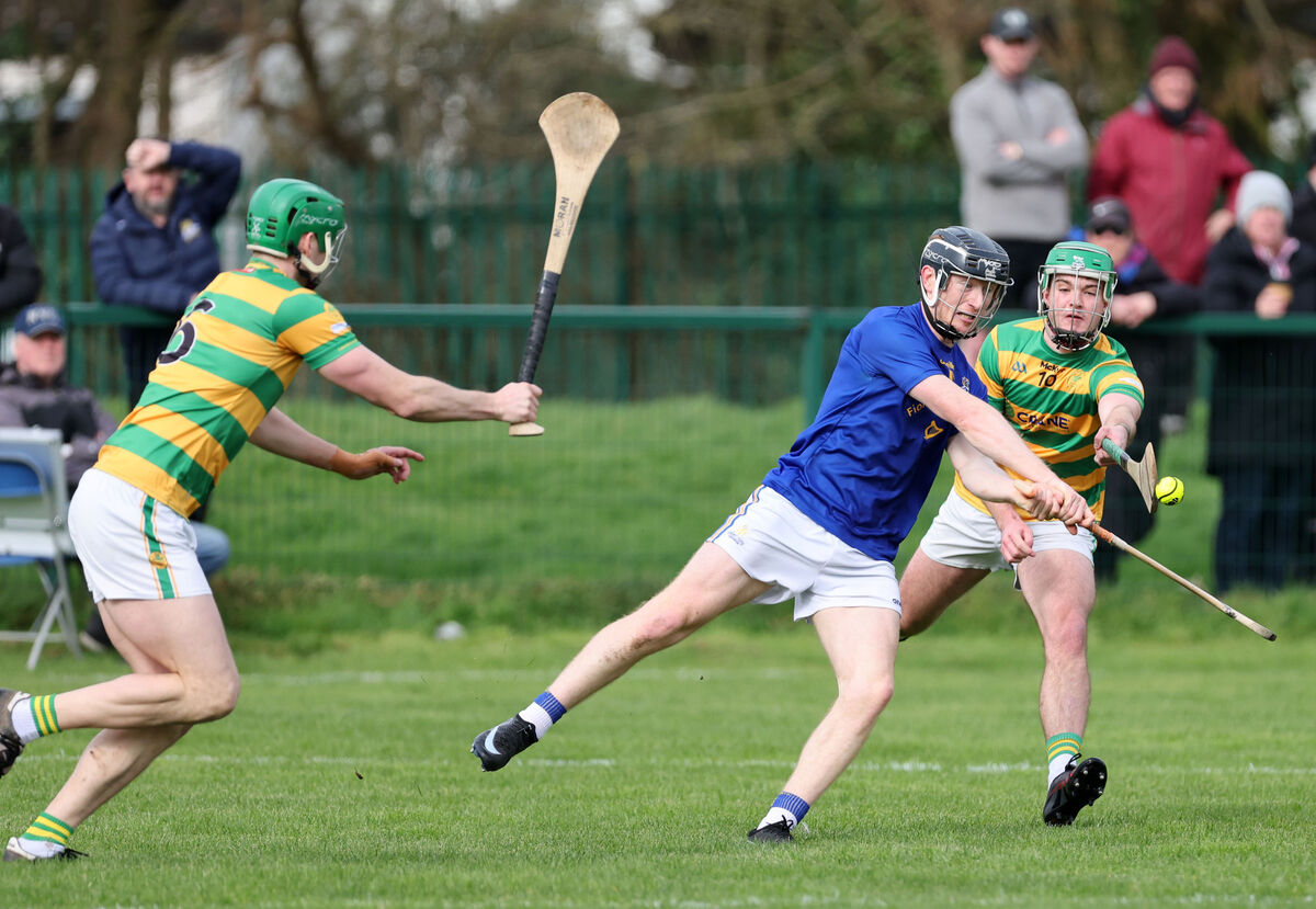 Jack Cahalane, St Finbarr's, shoots from John Cashman and Peter Lenihan, Blackrock. He has suffered another hamstring injury which will rule him out for the rest of the season. Picture: Jim Coughlan. Jack Cahalane, St Finbarr's, shoots from John Cashman and Peter Lenihan, Blackrock. He has suffered another hamstring injury which will rule him out for the rest of the season. Picture: Jim Coughlan.
