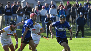 <p> Aidan Hackett of Sarsfields in action against Bandon duo Peter Murphy and Charlie Long in last year's Co-op SuperStores Cork IAHC semi-final - Sars are through to the knockout stages while the Lilywhites are among those looking to book their spot. Picture: Dan Linehan</p>
