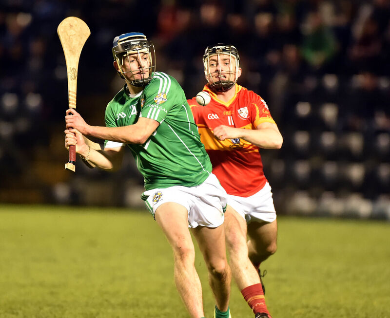 Aghada's John Looney shoots from Éire Óg's Kevin Hallissey. Picture: Eddie O'Hare Aghada's John Looney shoots from Éire Óg's Kevin Hallissey. Picture: Eddie O'Hare